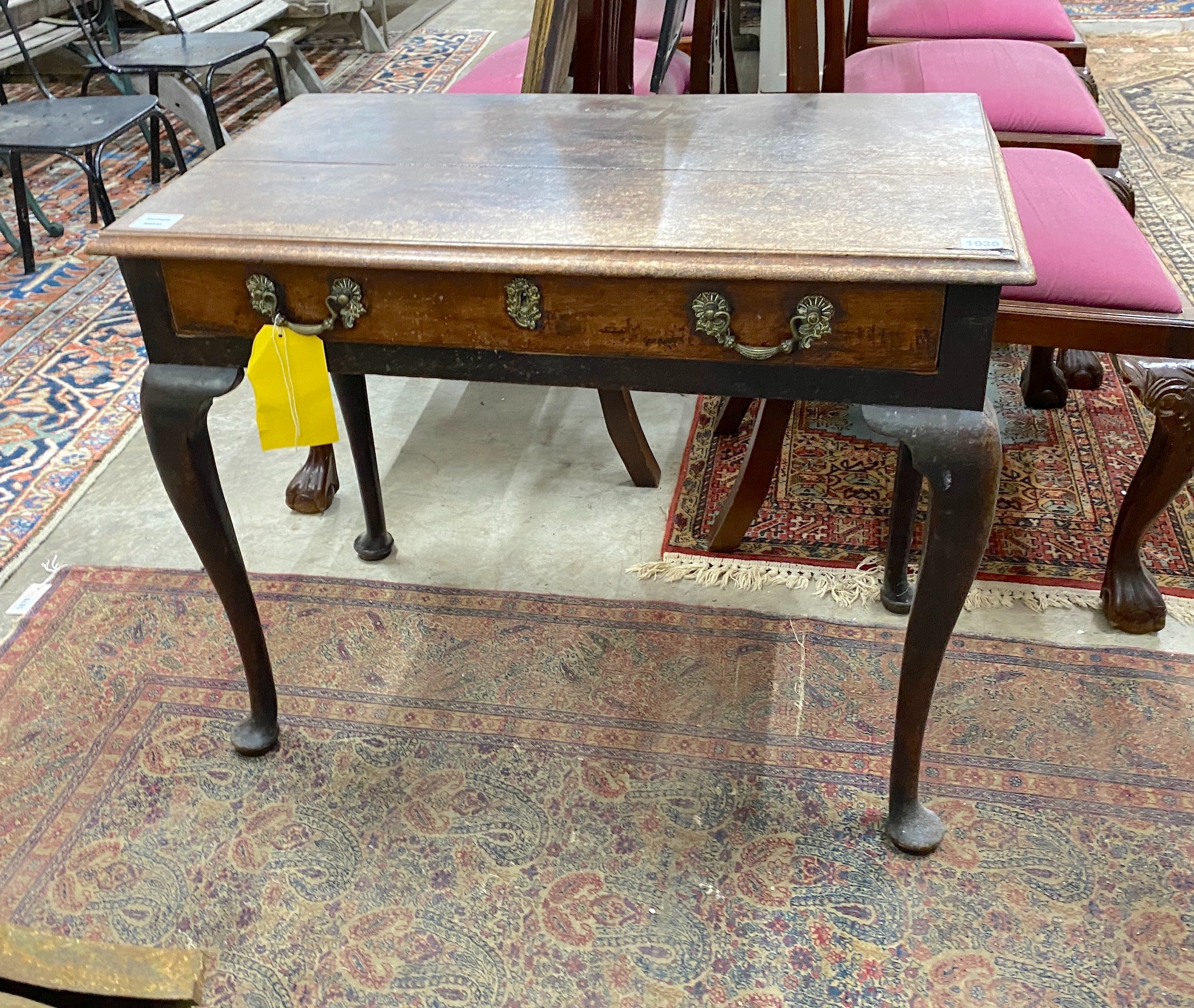 A George III mahogany side table, fitted with a single drawer, on cabriole legs, width 83cm, depth 48cm, height 67cm